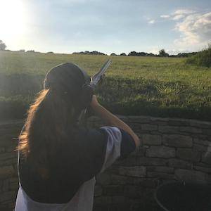 Female celebrity shooting clays