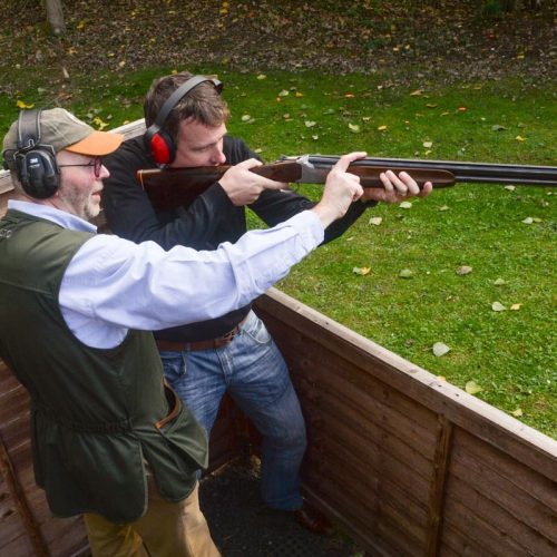 Two people shooting